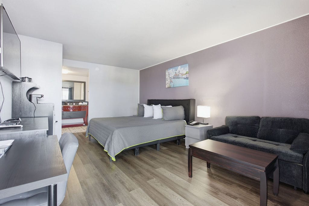 Premium King Room with sofa seating area and coffee table